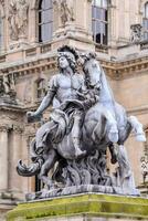 Statue of Louis XIV in Paris, France photo