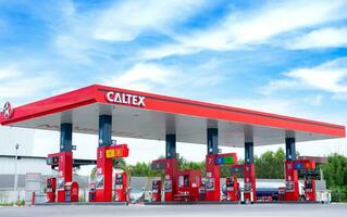 4 October 2023 Khonkean Thailand  New Caltex gas station and blue sky background photo