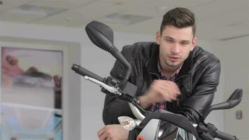 Close up of man sitting on motorbike video