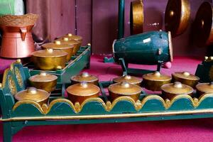 Batu - Indonesia, October 08, 2023. A set of traditional Javanese musical instruments called gamelan. photo