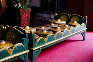 Batu - Indonesia, October 08, 2023. A set of traditional Javanese musical instruments called gamelan. photo