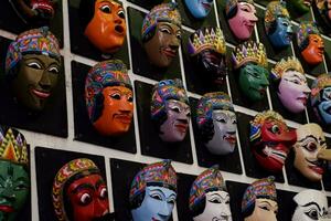 Batu - Indonesia, October 08, 2023. Various types of forms of Malangan Masks originating from Malang district. photo