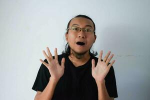 Adult Asian man wearing black t-shirt photo