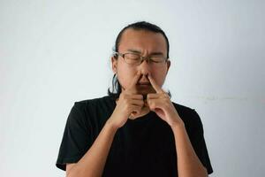 Adult Asian man wearing black t-shirt photo