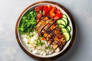 Grilled chicken breast with rice and vegetables in a bowl on a light background, Delicious buddha bowl with grilled chicken, fresh vegetables and rice on a light background. Top view, AI Generated photo