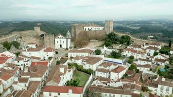 panorâmico Visão do a medieval Cidade do obidos dentro Portugal - aéreo puxar video