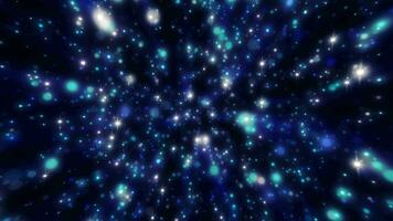 abstract blauw achtergrond van klein ronde bokeh deeltjes, mooi vakantie sneeuwvlokken, magisch sneeuw, energiek helder gloeiend kosmisch sterren video