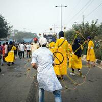 Delhi, India, October 2, 2023 - Sikhs display gatka and martial arts during annual Nagar Kirtan, Traditional, procession on account of birthday of Guru Nanak Dev ji, Nagar Kirtan in East Delhi area photo