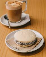 Cornstarch, coconut and dulce de leche alfajor, typical South American photo