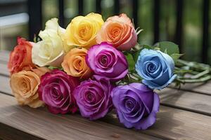Bunch of multi colored roses on wooden planks, happy birthday lying on planks. AI Generated photo