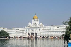 Amritsar, India, July 09 2023 - View of details of architecture inside Golden Temple Harmandir Sahib in Amritsar, Punjab, India, Famous indian sikh landmark, Golden Temple, the main temple photo