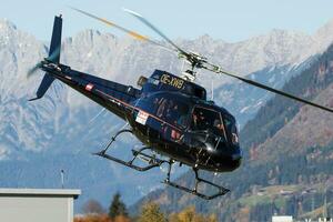 Commercial helicopter at airport and airfield. Rotorcraft. General aviation industry. Civil utility transportation. Air transport. Fly and flying. photo