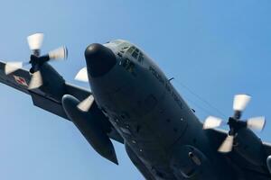 Polish Air Force Lockheed C-130 Hercules transport plane flying. Aviation and military aircraft. photo