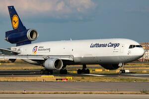 Lufthansa cargo plane at airport. Air freight shipping. Aviation and aircraft. Air transport. Global international transportation. Fly and flying. photo