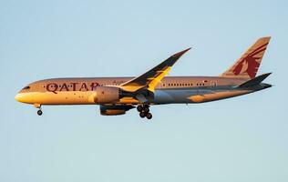 Qatar Airways passenger plane at airport. Schedule flight travel. Aviation and aircraft. Air transport. Global international transportation. Fly and flying. photo