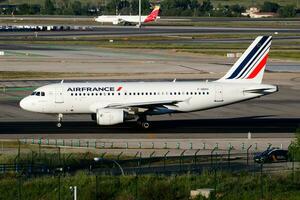 Air France passenger plane at airport. Schedule flight travel. Aviation and aircraft. Air transport. Global international transportation. Fly and flying. photo