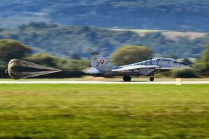 Military fighter jet plane at air base. Air force flight operation. Aviation and aircraft. Air defense. Military industry. Fly and flying. photo