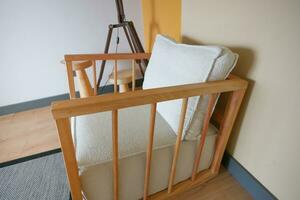 retro vantage armchairs with a lamp at home . photo