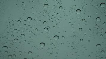 Rain fell as water droplets flow.Rain fell on the car Windows video