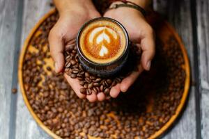 Cafe latte with roasted coffee beans photo