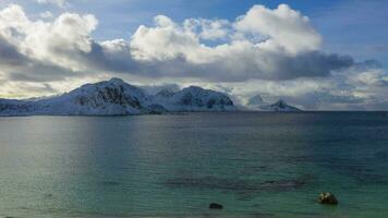 Haukland Beach and Mountains. Lofoten Islands, Norwegian Sea, Norway. Aerial Hyper Lapse, Time Lapse. Drone Flies Forward video