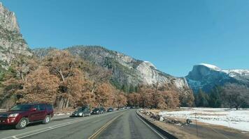 YOSEMITE VALLEY, USA - DECEMBER 9, 2019 Driving Car in Yosemite Valley. Half Dome. California USA. video