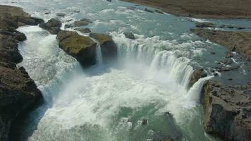Godafoss Waterfall in Summer Sunny Day. Iceland. Aerial View. Drone Flies Forward, Tilt Down video