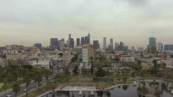 LOS ANGELES, USA - DECEMBER 1, 2018 Los Angeles Downtown Skyline. California, USA. Aerial View from MacArthur Park. Drone Flies Upwards and Forward video