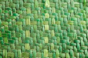 Weaved green basket pattern photo
