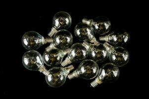 Light bulbs on black background photo