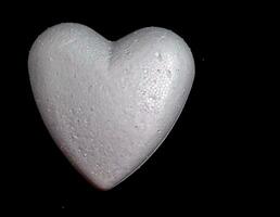 Heart on dark background photo