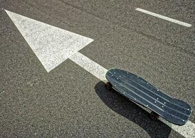 Skateboard on the road photo