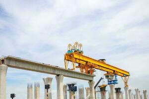 High-speed rail infrastructure construct concepts, Construction of a mass transit train line in progress with heavy infrastructure photo