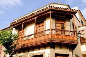 a building with wooden balconies photo