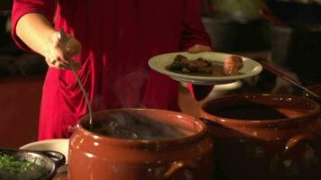 Typical Brazilian feijoada in a self-service style video