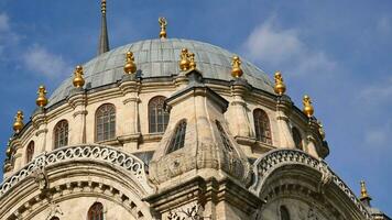 the dome of a mosque against blue sky in istanbul video