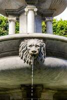 Fountain with a lion head photo