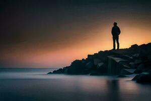 un hombre soportes en un rock en el Oceano a puesta de sol. generado por ai foto