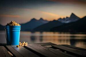 a bucket of popcorn on a wooden table in front of a lake. AI-Generated photo