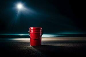 a red bucket sitting on the beach at night. AI-Generated photo