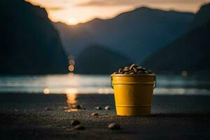 a bucket of nuts on the beach at sunset. AI-Generated photo