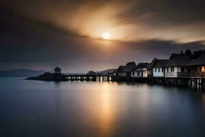 un largo exposición fotografía de un muelle y casas a noche. generado por ai foto