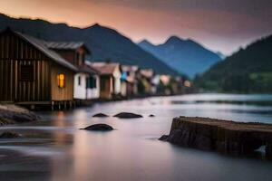 a lake with houses and rocks in the background. AI-Generated photo