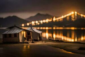 a small hut sits on the shore of a lake at night. AI-Generated photo