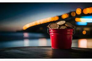 a red bucket with coins sitting on a table. AI-Generated photo