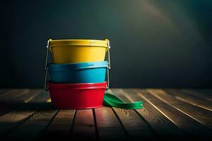 three colorful buckets on a wooden table. AI-Generated photo