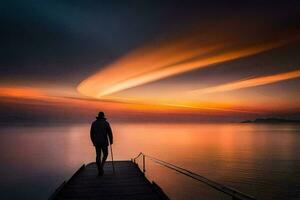 a man stands on a pier looking at the sunset. AI-Generated photo