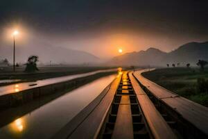 a train track in the fog with the sun setting. AI-Generated photo