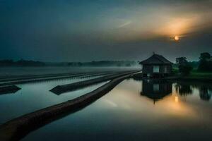 un casa se sienta en el borde de un lago a amanecer. generado por ai foto