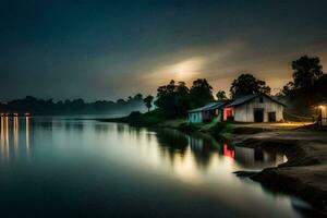 un pequeño casa se sienta en el apuntalar de un lago a noche. generado por ai foto